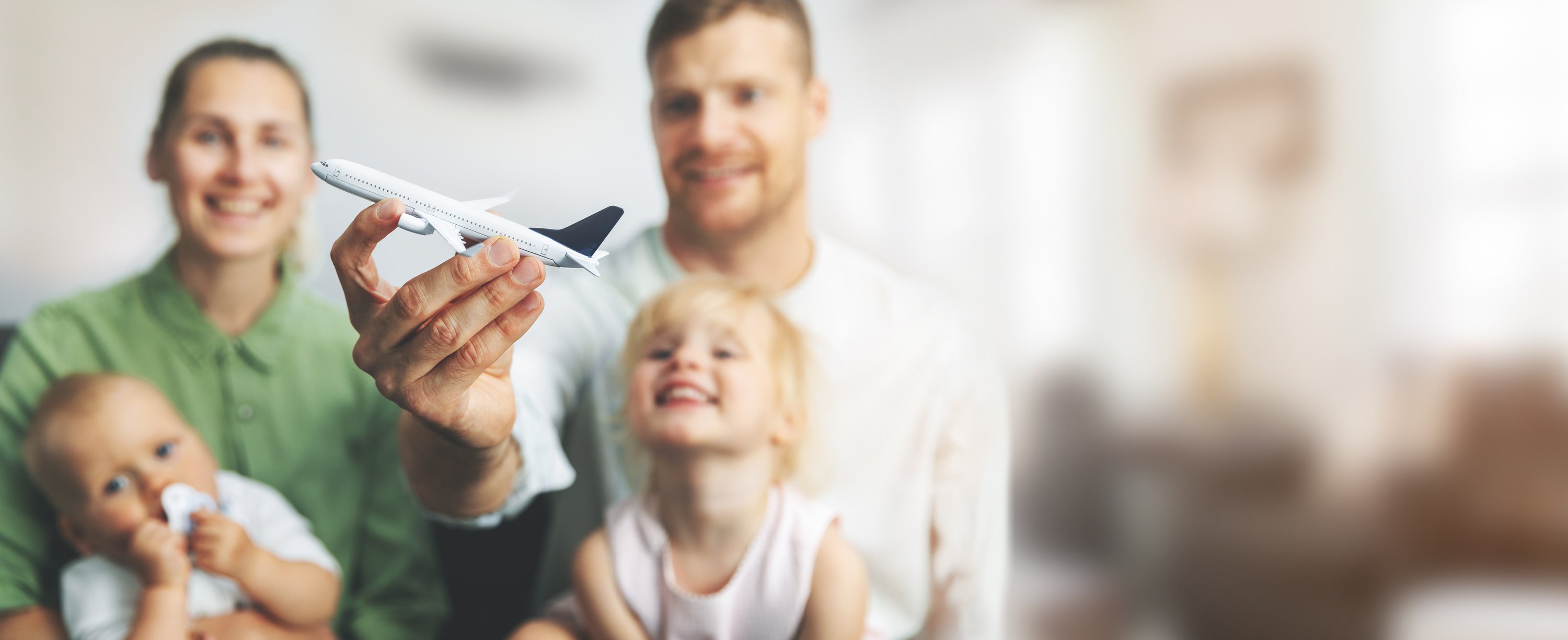 family traveling - parents with children dreaming about their next vacations